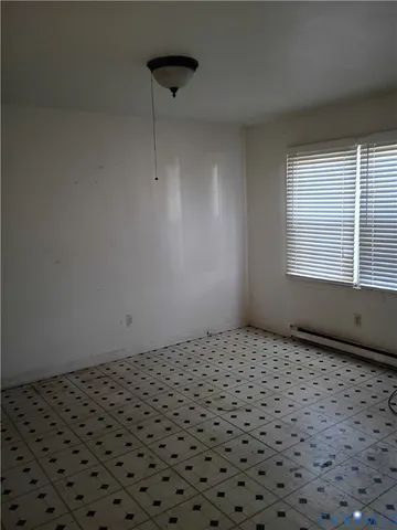 a view of a room with a window