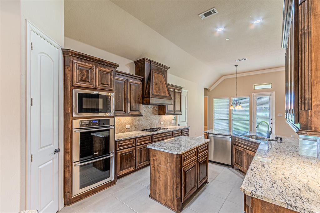 1720 Lincoln Road Lucas, TX 75002 - Photo 5 of 30 Double oven and oversized gas cooktop