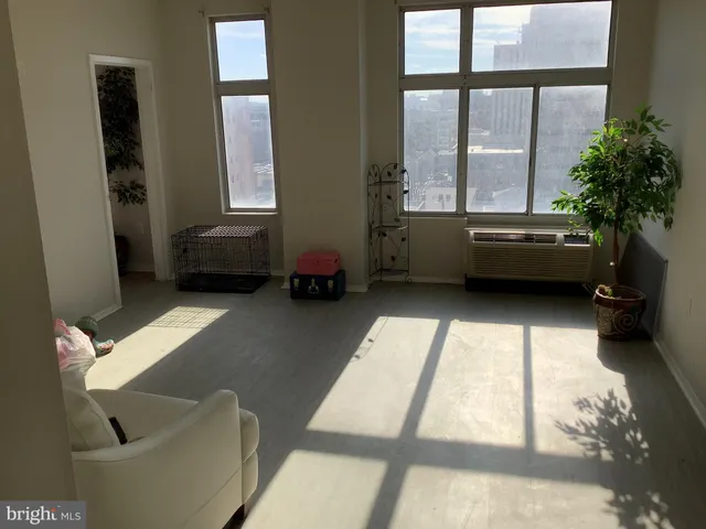 a kitchen with stainless steel appliances granite countertop a stove a refrigerator and a microwave