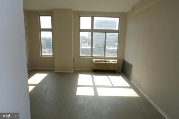 an empty room with windows