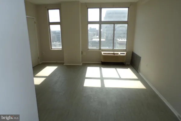 an empty room and window