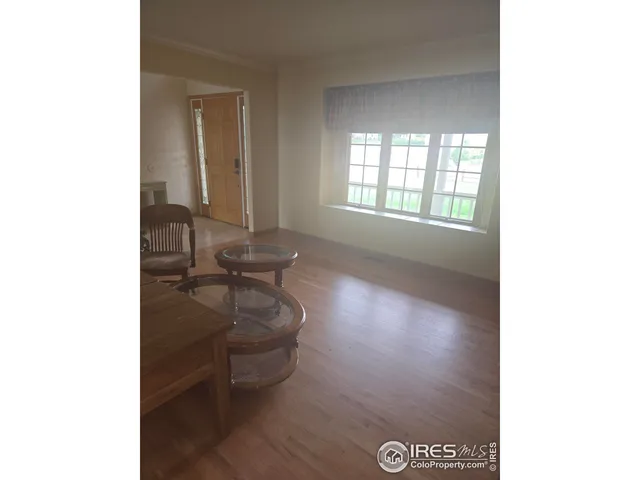 a room with a sink and a mirror