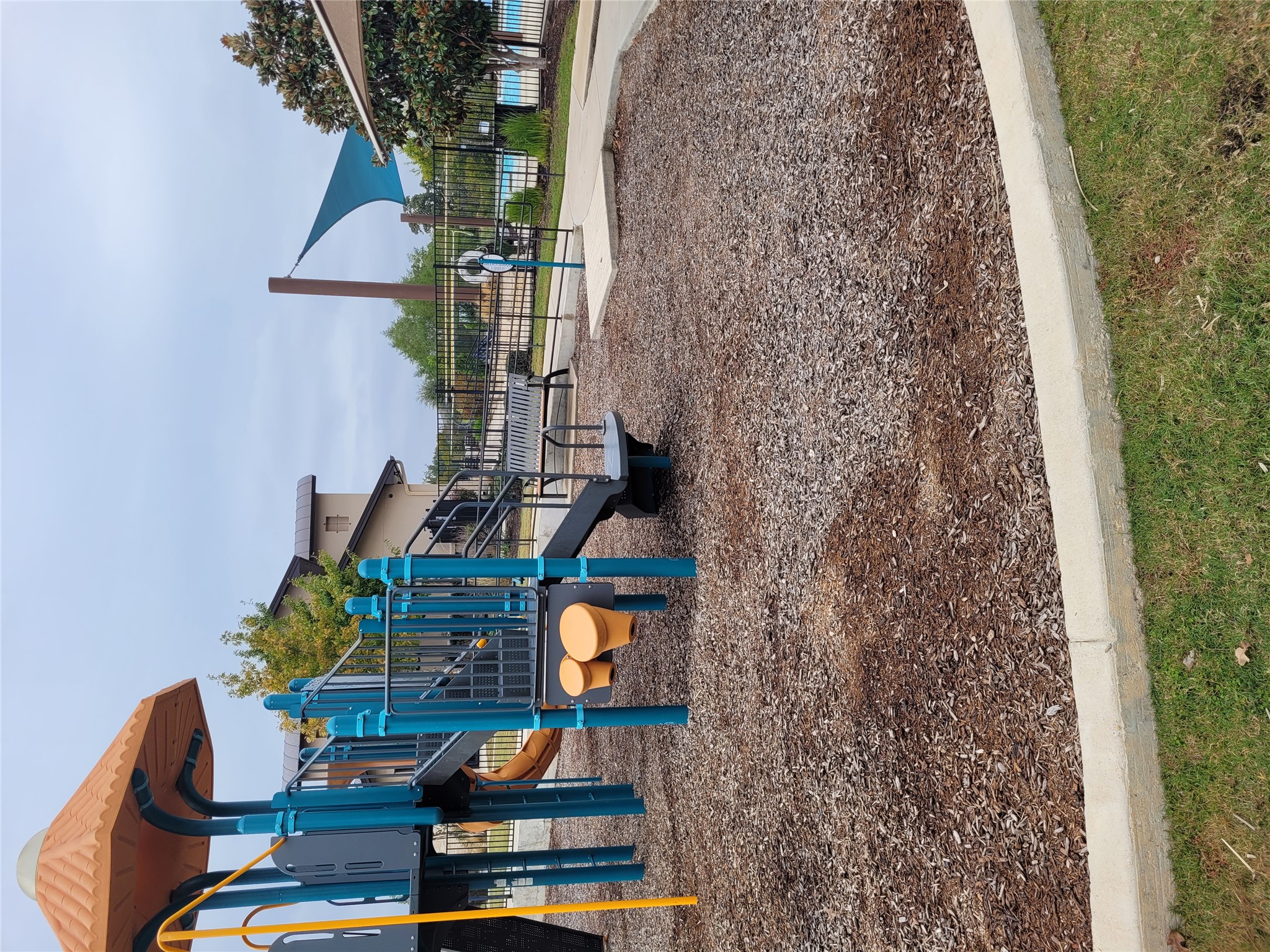 120 Free Stone Drive Georgetown, TX 78628 - Photo 37 of 40 Kids love this well-maintained playground, featuring vibrant equipment and a shaded seating area.