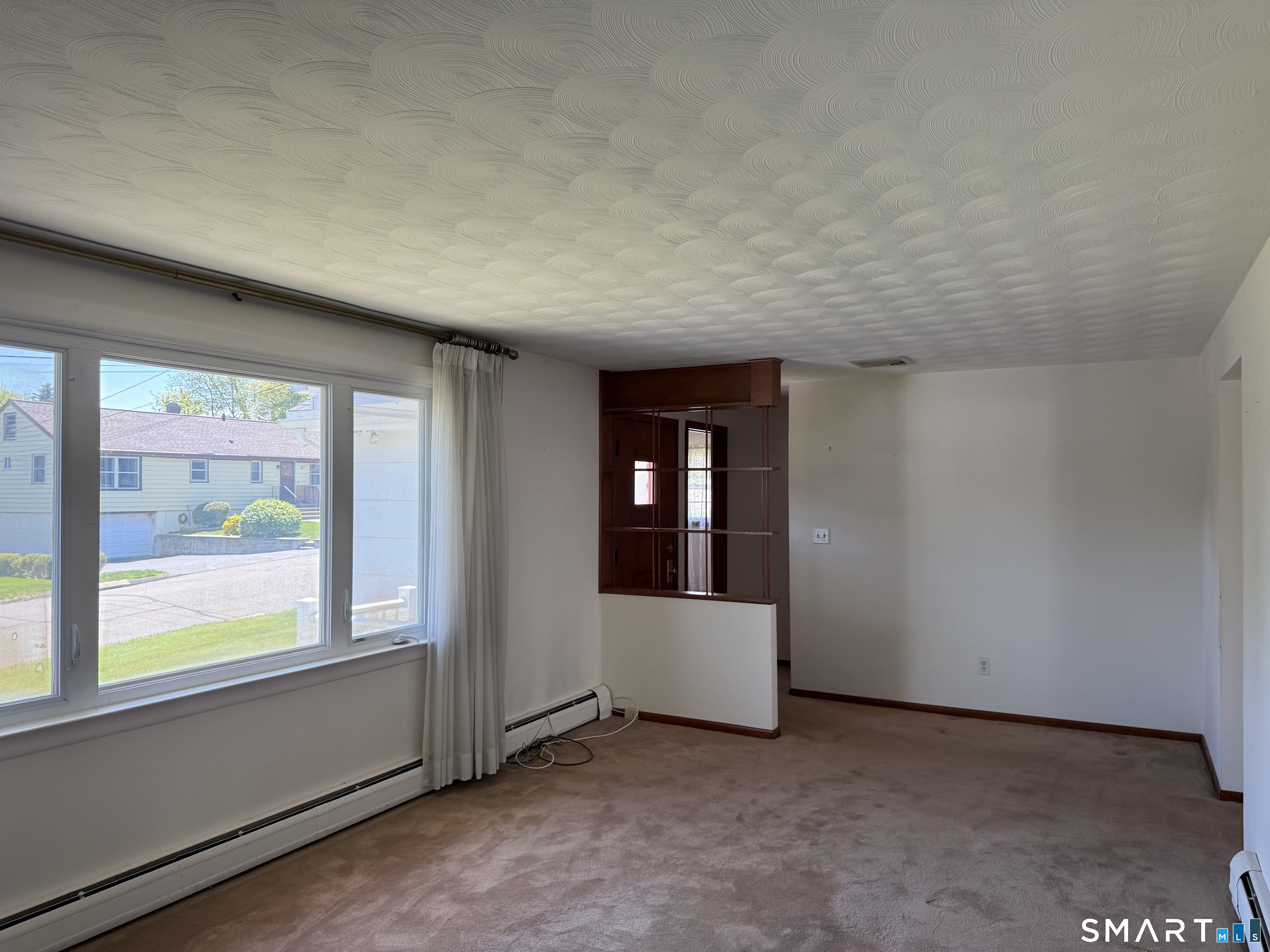 26 Maple Street Trumbull, CT 06611 - Photo 20 of 37 an empty room with windows