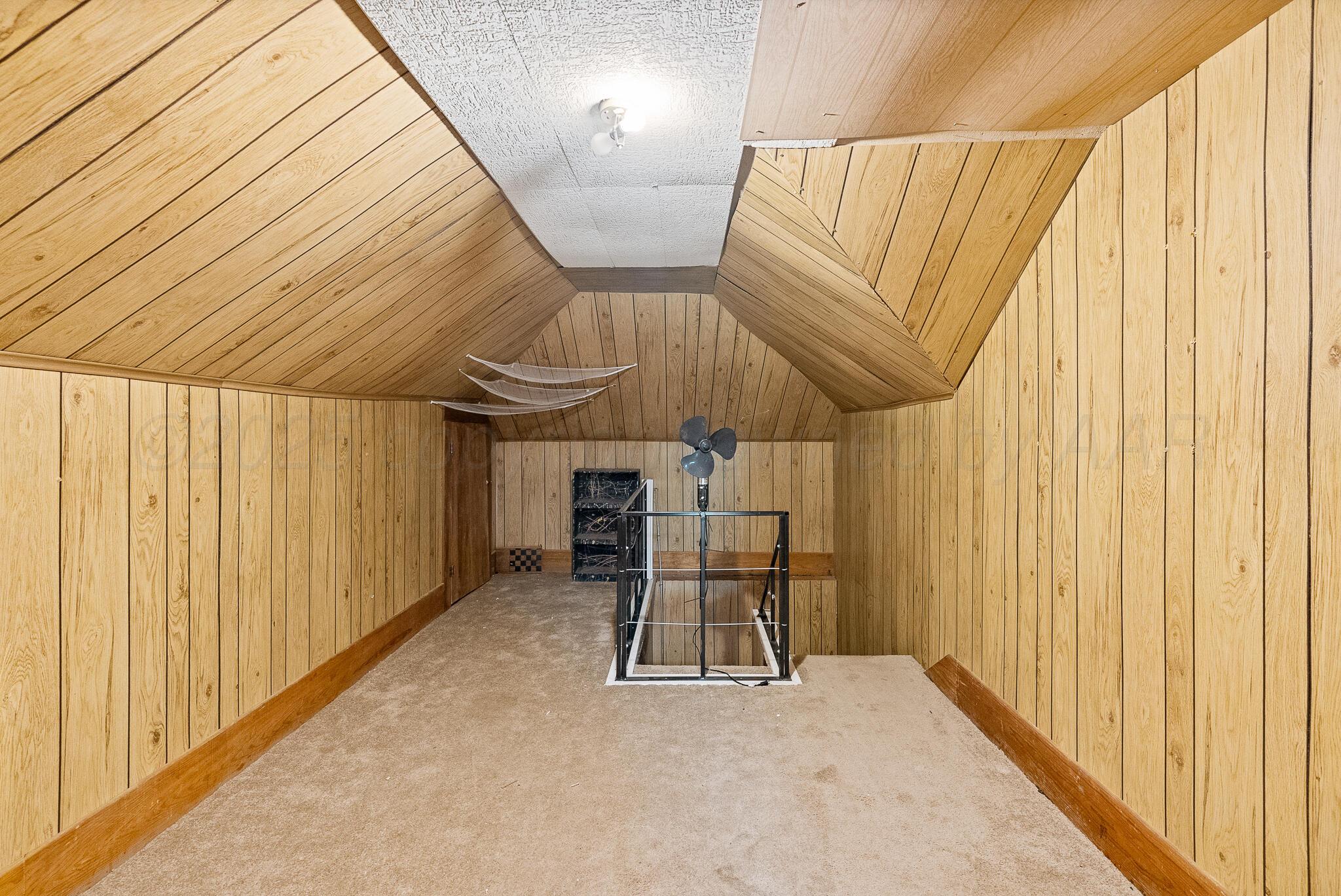 4124 Crockett Street Amarillo, TX 79110 - Photo 17 of 25 a view of entryway with wooden floor