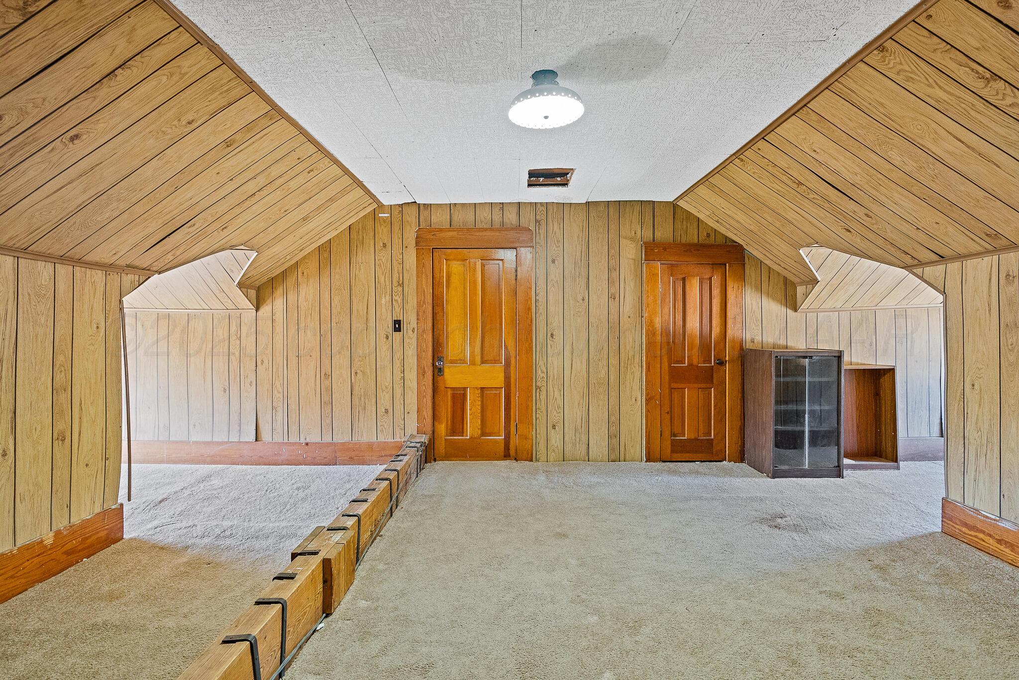 4124 Crockett Street Amarillo, TX 79110 - Photo 19 of 25 a view of a bedroom with balcony