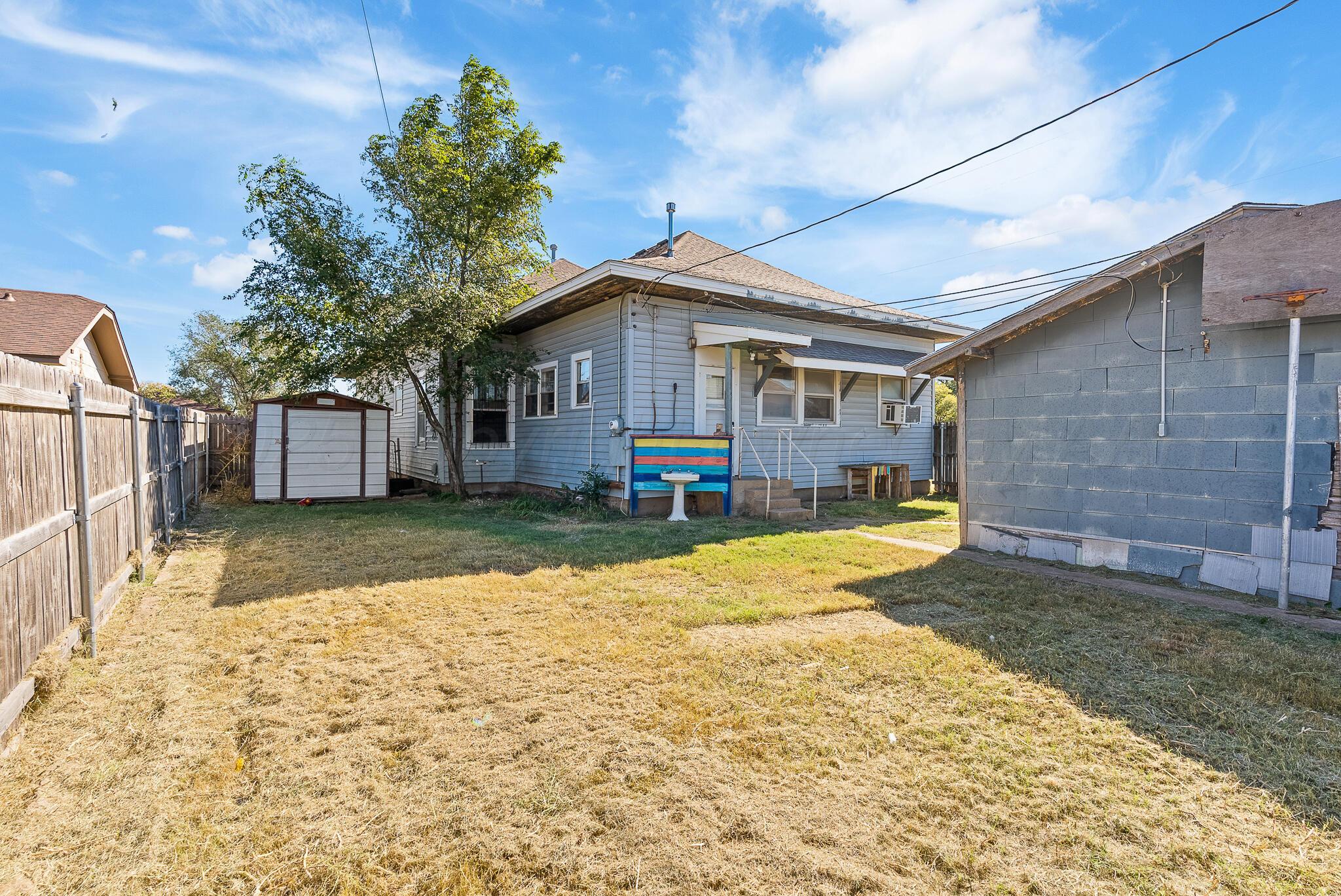 4124 Crockett Street Amarillo, TX 79110 - Photo 24 of 25 a house view with a swimming pool