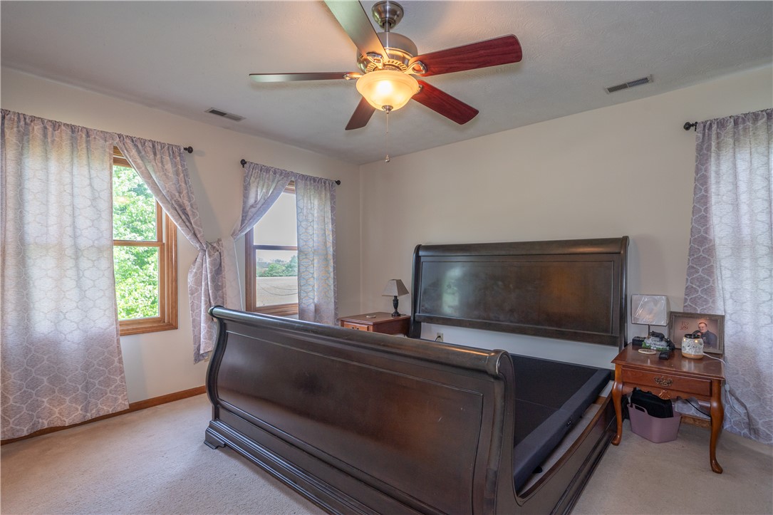 3628 Petre Road Springfield, OH 45502 - Photo 18 of 52 This inviting bedroom features ample natural light and a comforting atmosphere.