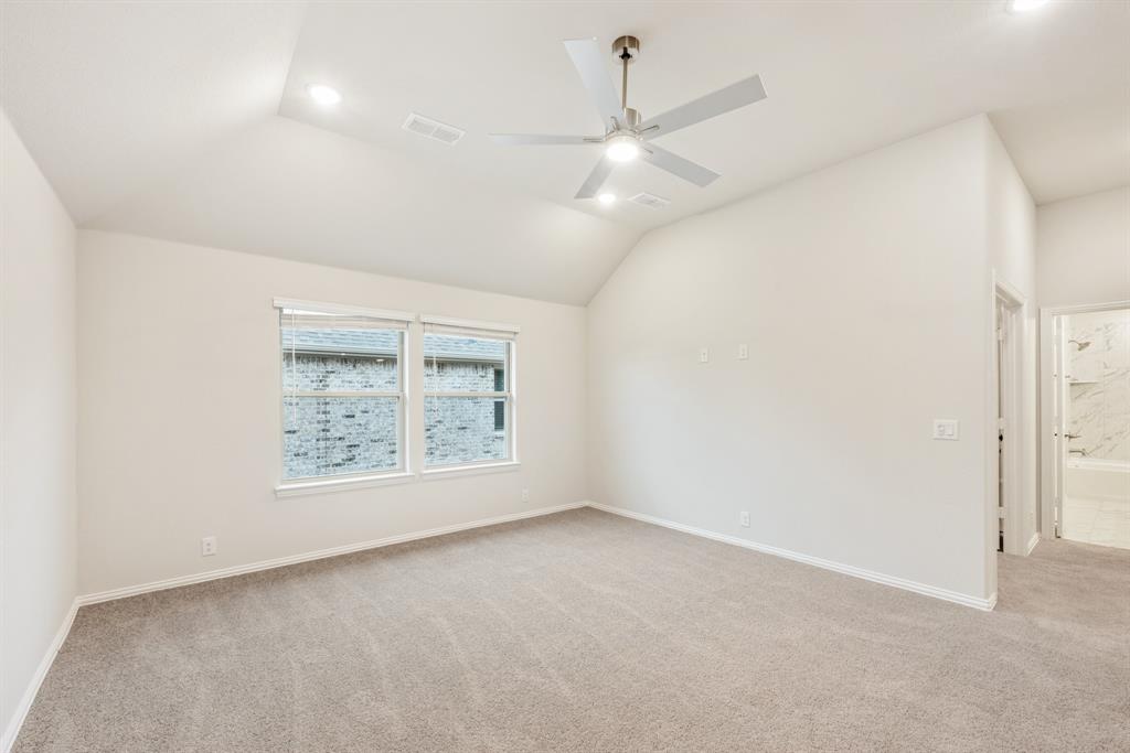 1113 Cardinal Drive Midlothian, TX 76065 - Photo 23 of 34 an empty room with a empty space and a ceiling fan