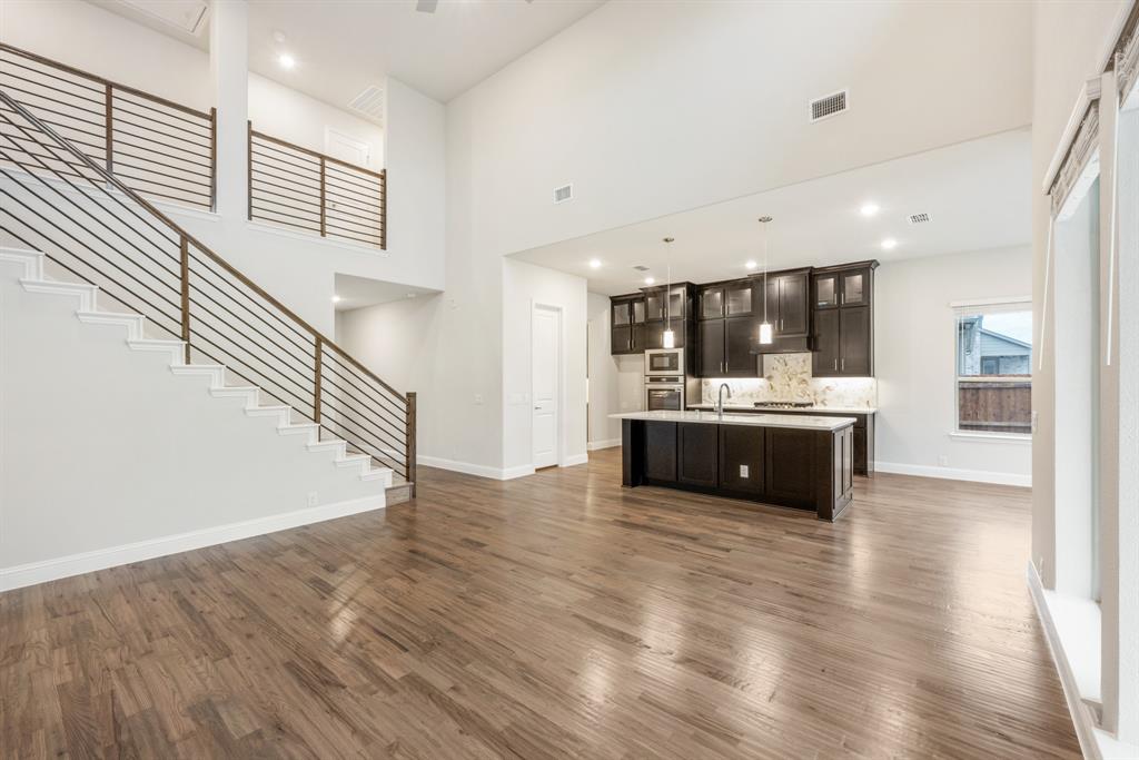 1113 Cardinal Drive Midlothian, TX 76065 - Photo 7 of 34 a view of kitchen with sink and wooden floor