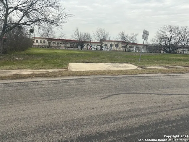 a view of a lake with a big yard