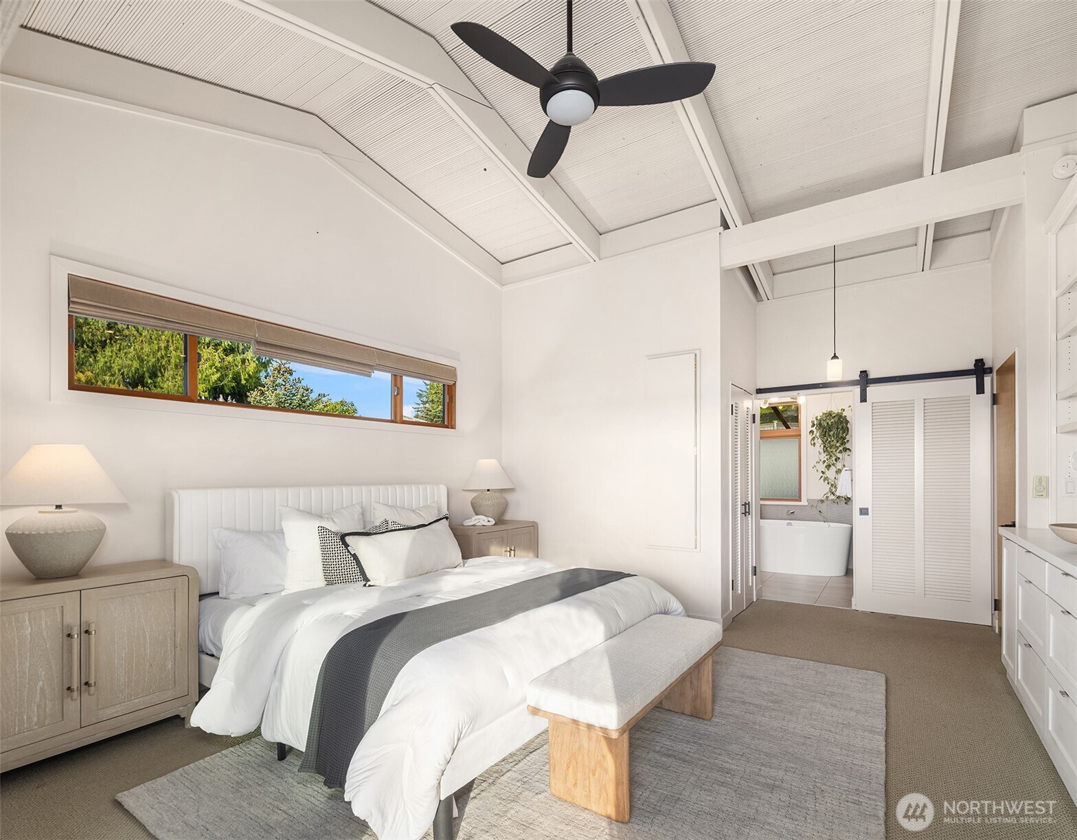 2826 Southwest 170th Street Burien, WA 98166 - Photo 23 of 40 a bedroom with a bed and a cabinets