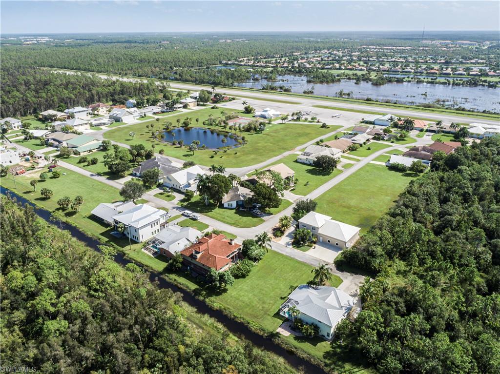 4049 Skyway Drive Naples, FL 34112 - Photo 29 of 31 an aerial view of multiple house
