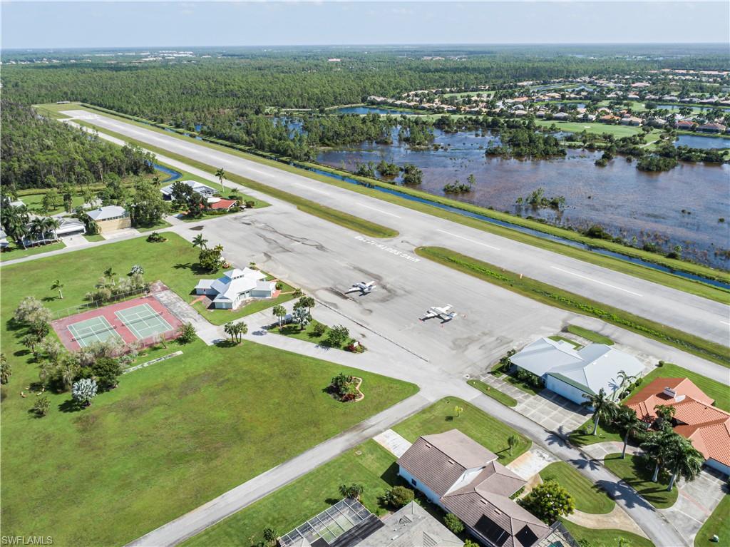 4049 Skyway Drive Naples, FL 34112 - Photo 3 of 31 an aerial view of a city