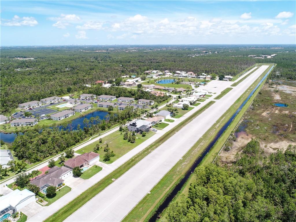 4049 Skyway Drive Naples, FL 34112 - Photo 4 of 31 a view of a city from a terrace