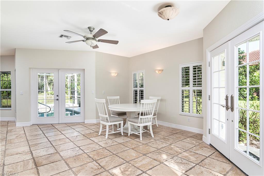 4049 Skyway Drive Naples, FL 34112 - Photo 8 of 31 a dining room with furniture and window