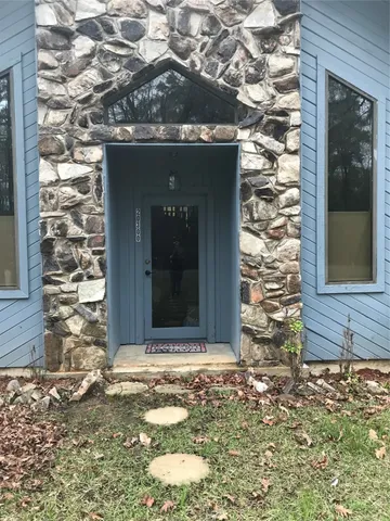 a front view of a house with a window