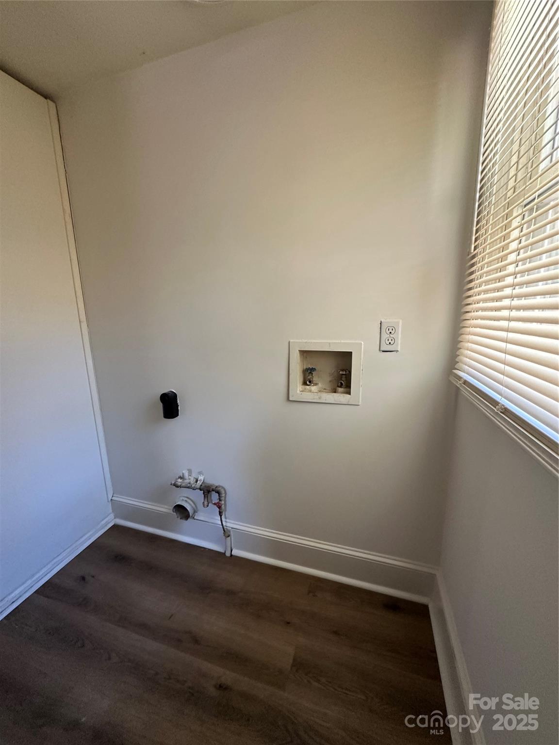 1215 Summerville Road, Unit 112 Charlotte, NC 28214 - Photo 15 of 20 wooden floor in an empty room