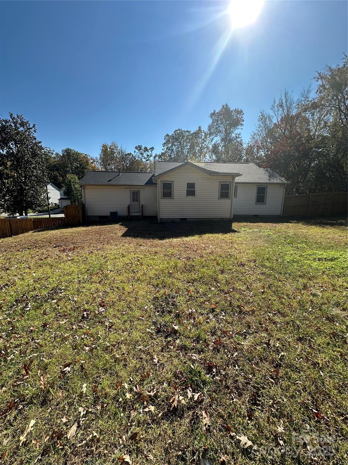 1215 Summerville Road, Unit 112 Charlotte, NC 28214 - Photo 20 of 20 a view of a house with a yard