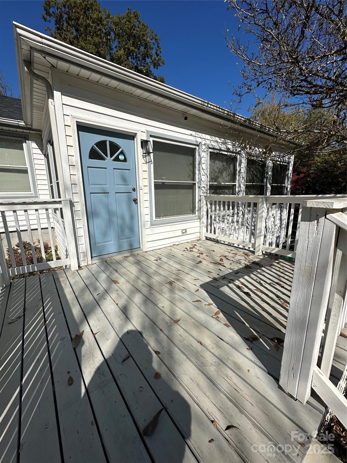 1215 Summerville Road, Unit 112 Charlotte, NC 28214 - Photo 4 of 20 a view of a backyard with sitting area