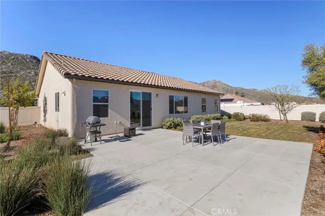 a view of a house with patio