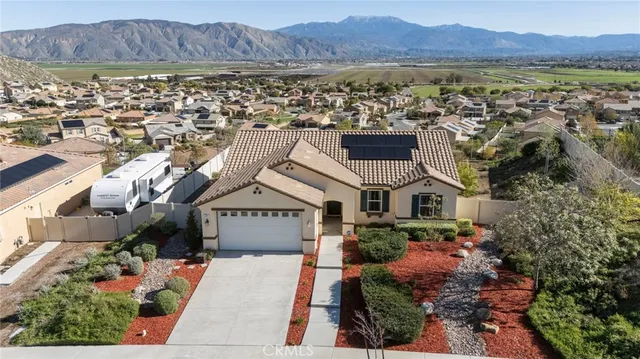 a view of a house with a lake view