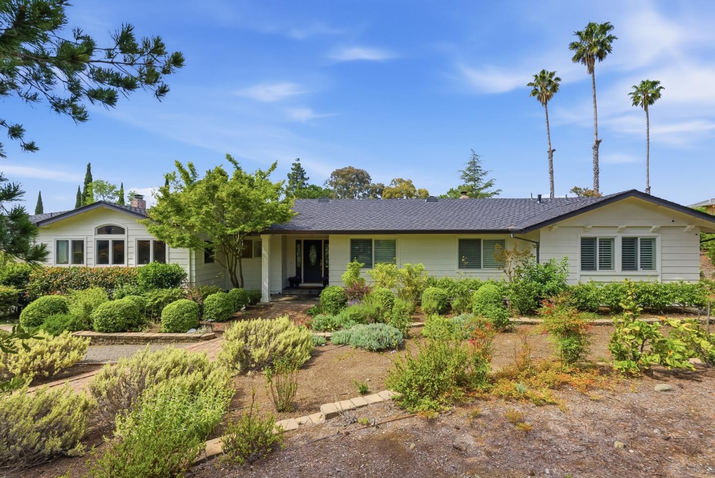 285 Ridgeway Road Woodside, CA 94062 - Photo 28 of 28 a front view of a house with a yard