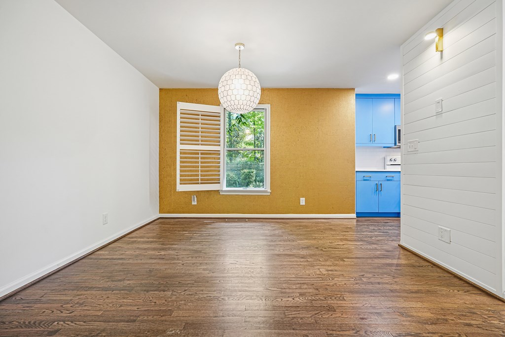 230 Chestnut Rise Trail Big Canoe, GA 30143 - Photo 14 of 45 a view of an empty room with wooden floor and windows