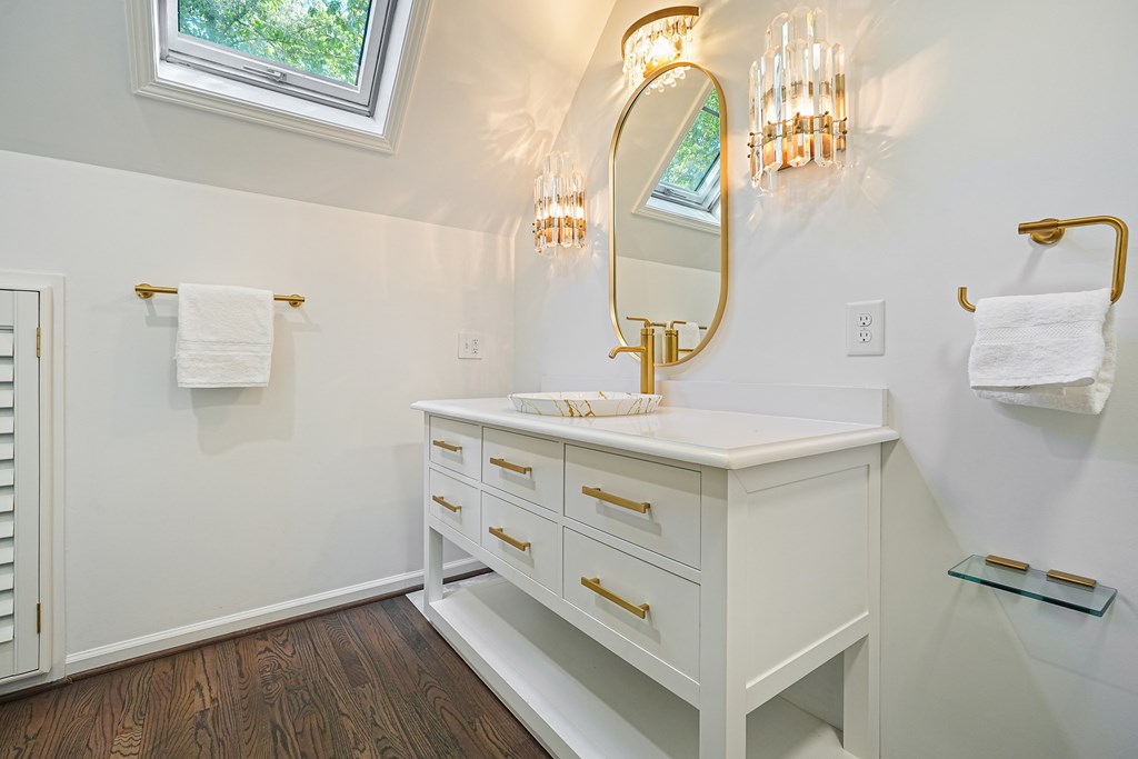 230 Chestnut Rise Trail Big Canoe, GA 30143 - Photo 29 of 45 a bathroom with a sink and a mirror