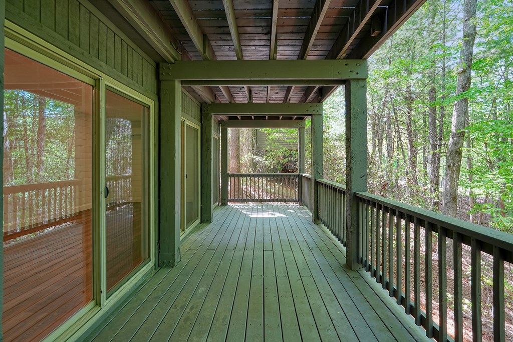 230 Chestnut Rise Trail Big Canoe, GA 30143 - Photo 39 of 45 a view of a balcony with wooden floor