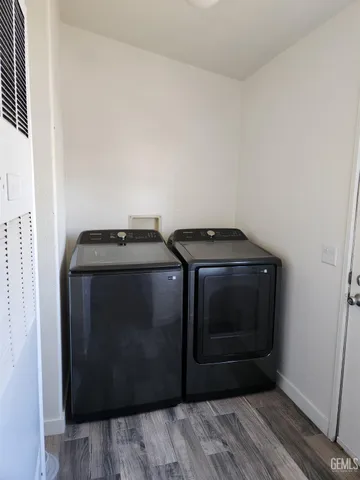 a utility room with washer and dryer