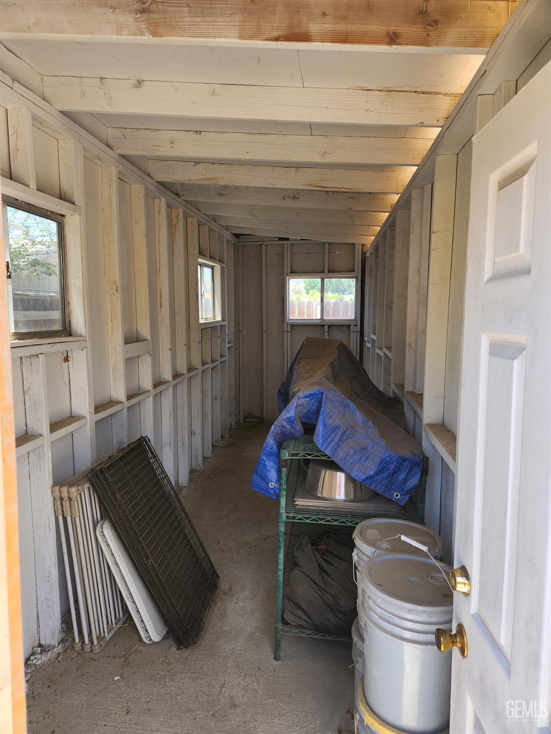 Undisclosed Address Bakersfield, CA 93314 - Photo 26 of 28 a living room with furniture and a potted plant