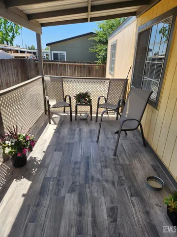 a view of a terrace with furniture