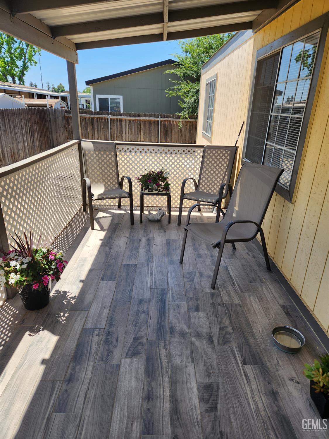 Undisclosed Address Bakersfield, CA 93314 - Photo 3 of 28 a view of a terrace with furniture