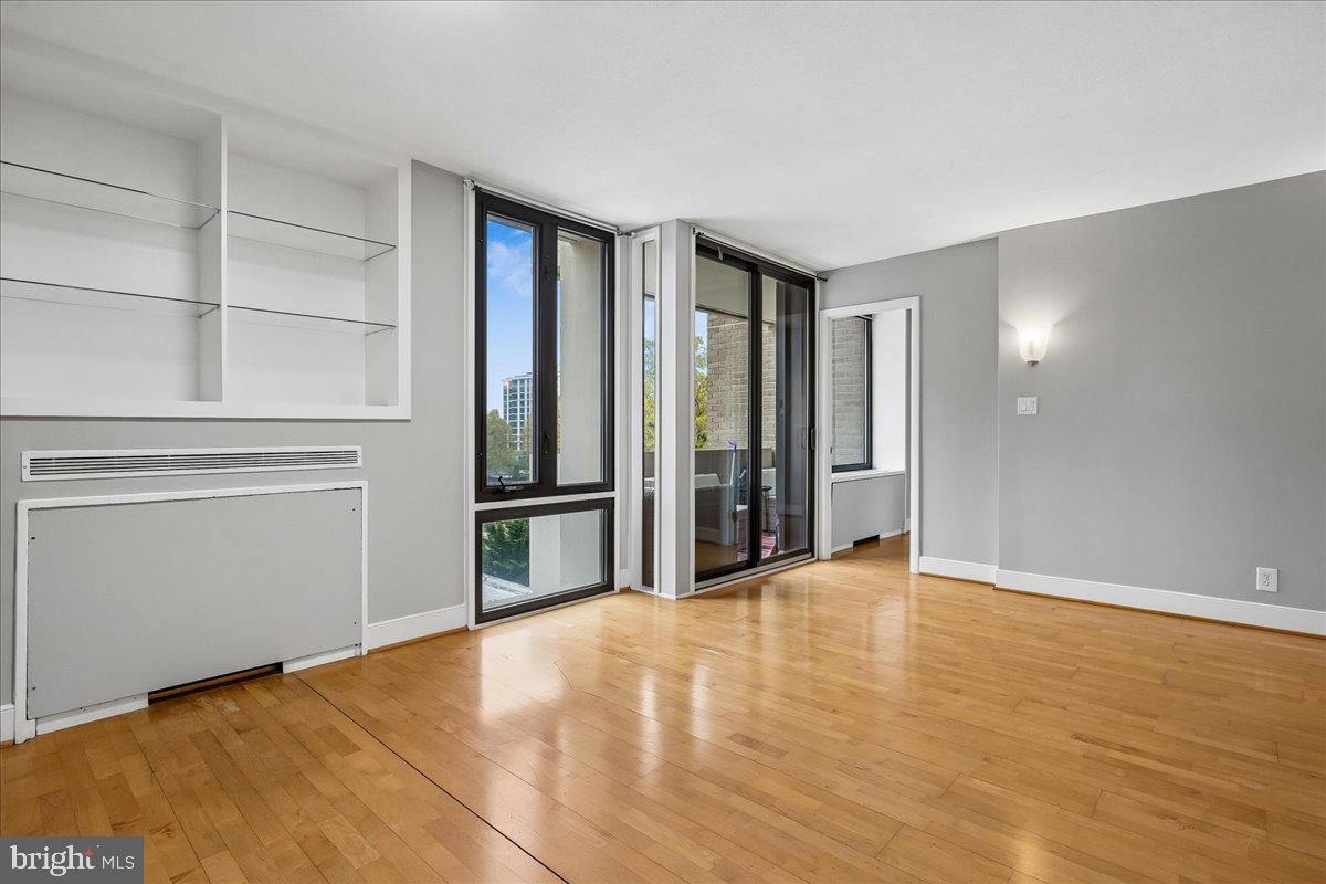 1245 4th Street Southwest, Unit E409 Washington, DC 20024 - Photo 12 of 21 a view of an empty room with closet area