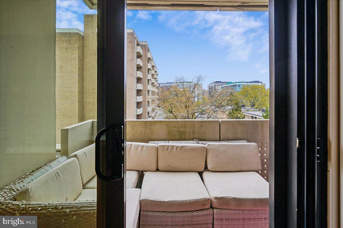1245 4th Street Southwest, Unit E409 Washington, DC 20024 - Photo 14 of 21 a view of a balcony with furniture