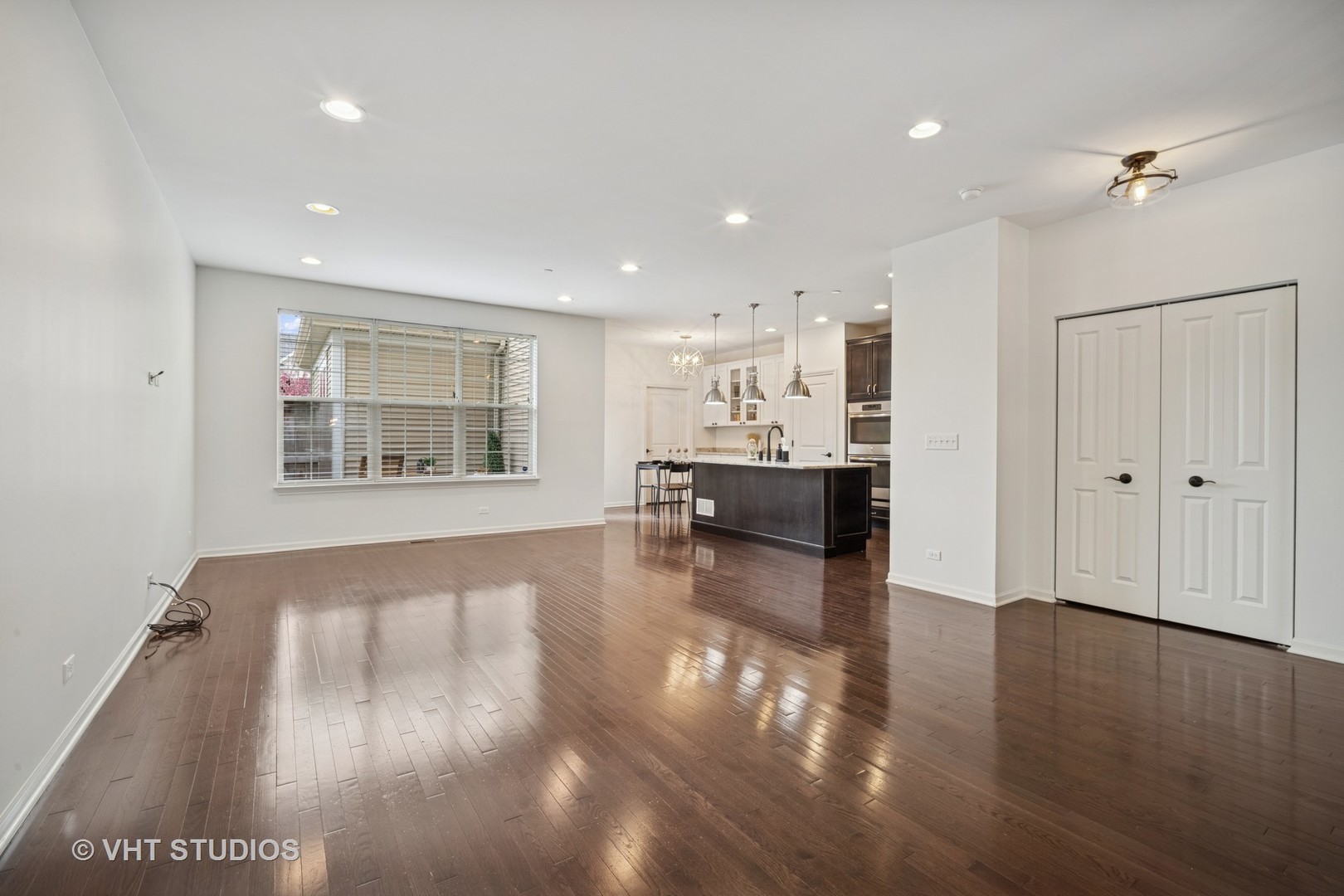 1981 Dauntless Drive Glenview, IL 60026 - Photo 15 of 43 a view of kitchen and hall with wooden floor and a window