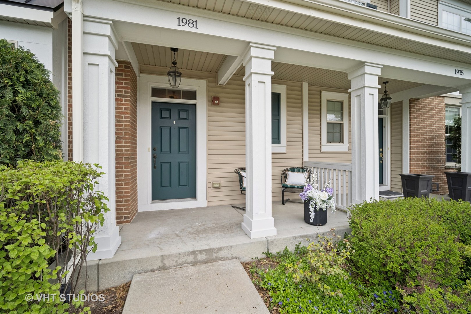 1981 Dauntless Drive Glenview, IL 60026 - Photo 3 of 43 front view of a house with potted plants