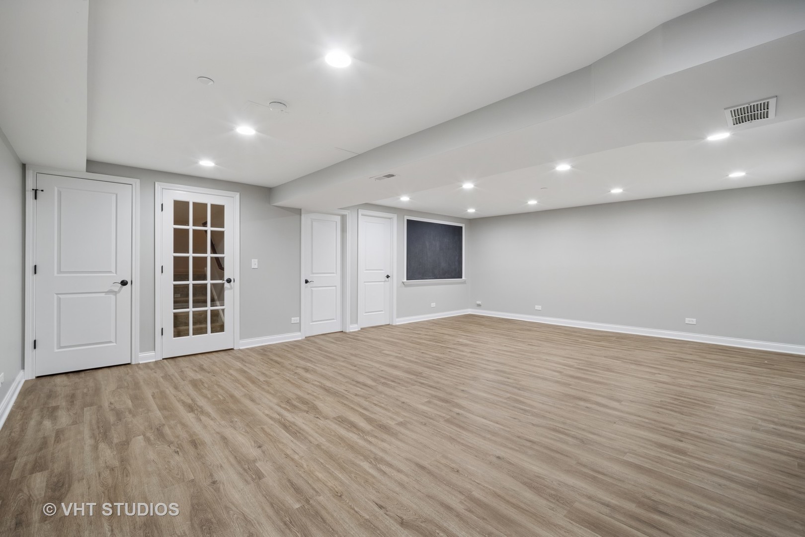 1981 Dauntless Drive Glenview, IL 60026 - Photo 34 of 43 a view of empty room with wooden floor and windows
