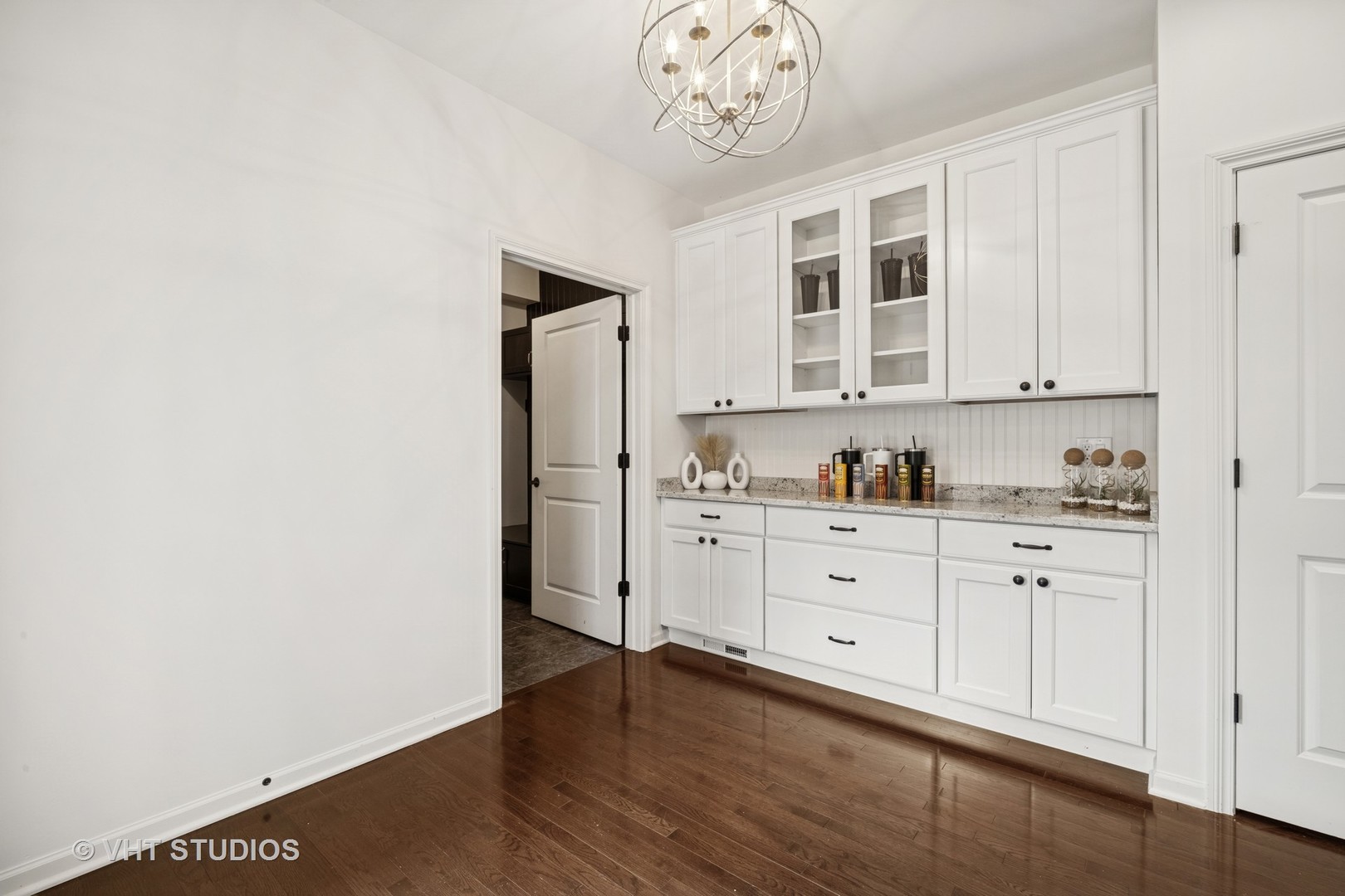1981 Dauntless Drive Glenview, IL 60026 - Photo 6 of 43 a kitchen with granite countertop white cabinets and stainless steel appliances