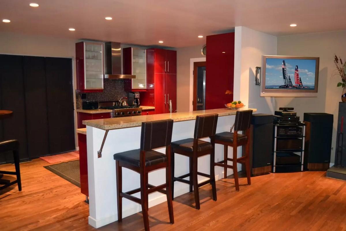 429 Terrace Road Santa Barbara, CA 93109 - Photo 2 of 6 a dining hall with stainless steel appliances a dining table and chairs with wooden floor