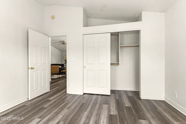 a view of wooden floor in an empty room