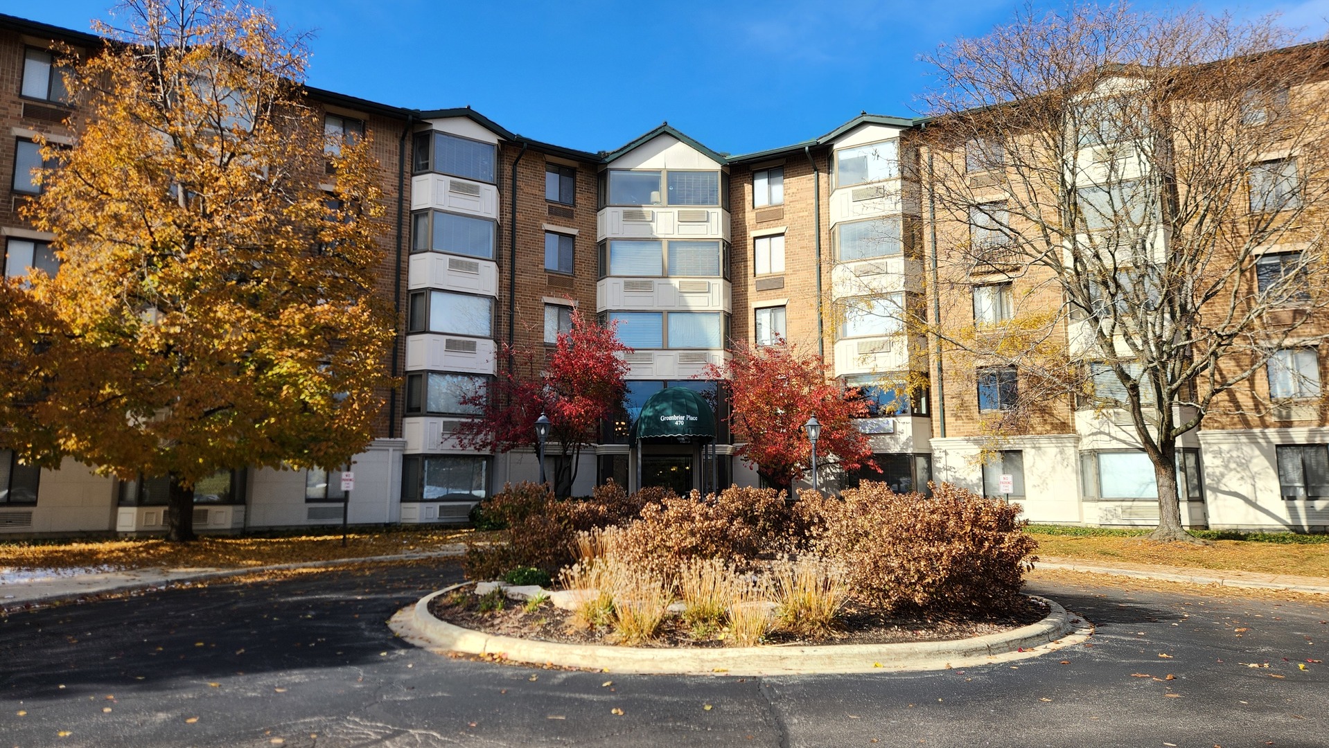 470 Fawell Boulevard, Unit 317 Glen Ellyn, IL 60137 - Photo 1 of 1 a view of a building with a street