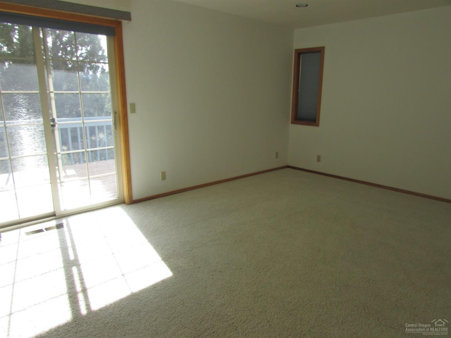 20835 Rorick Drive Bend, OR 97701 - Photo 21 of 25 Large upstairs master which has a slider