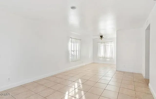 a view of an empty room and window