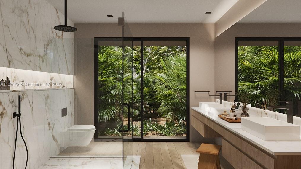 26 Bay Heights Drive Miami, FL 33133 - Photo 11 of 14 a bathroom with a sink and a mirror