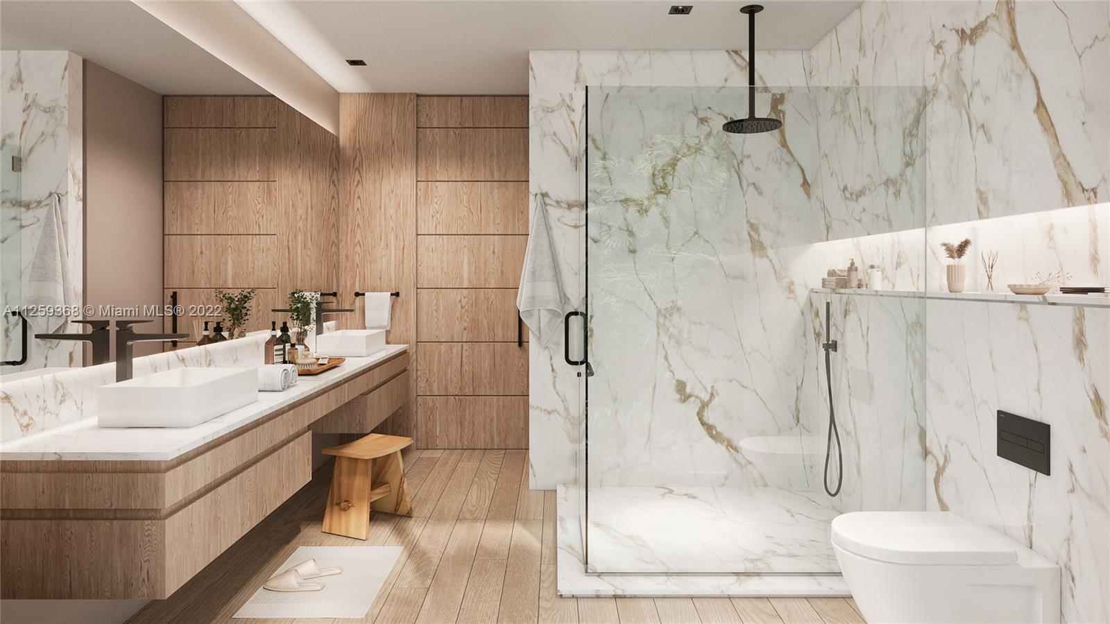 26 Bay Heights Drive Miami, FL 33133 - Photo 12 of 14 a bathroom with a sink toilet and shower