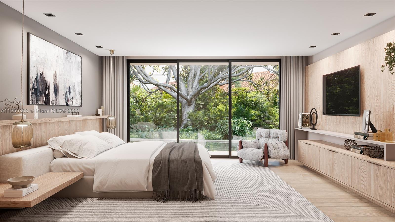 26 Bay Heights Drive Miami, FL 33133 - Photo 10 of 14 a bedroom with a large bed and a large window