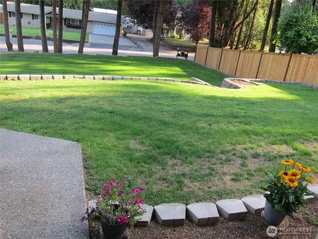 a view of a backyard with a garden