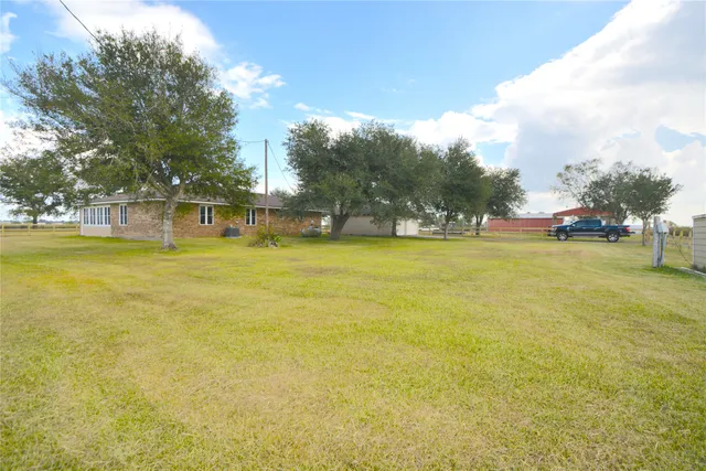a view of a swimming pool and an outdoor space